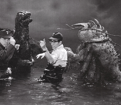 Special effects director Sadamasa Arikawa (center) sets up a fight between Godzilla and the Sea Monster (a.k.a., Ebirah). 