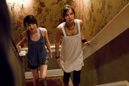 Anna (Emily Browning) and Alex (Arielle Kebbel) hear things go bump in the night