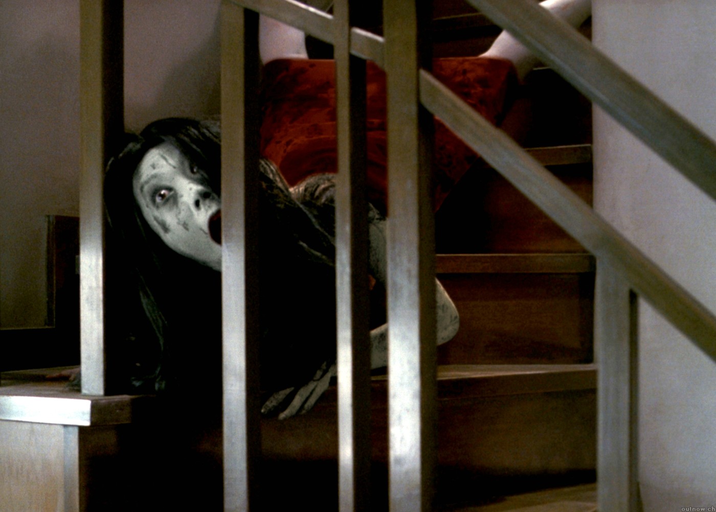 Kayako (Takako Fuji) performs her infamous downstairs crawl in the American remake.