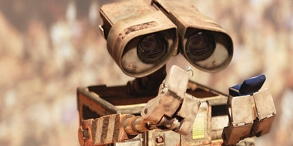 Wall-E examines an engagement ring - then throws it away and keeps the box!