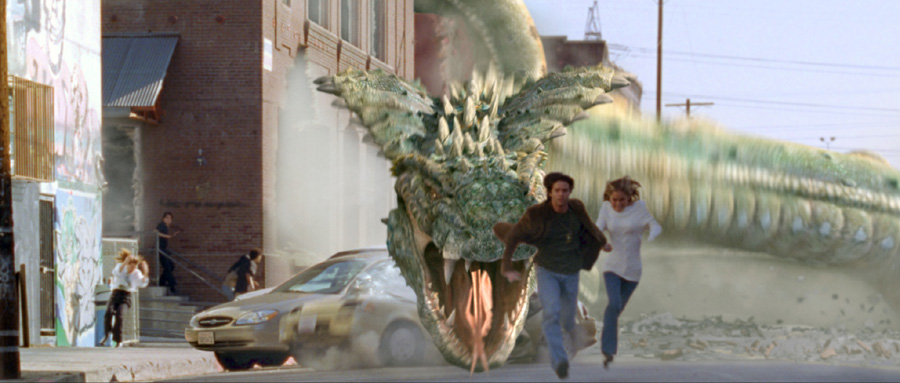 Jason Behr and Amanda Brooks flee the rampaging serpent