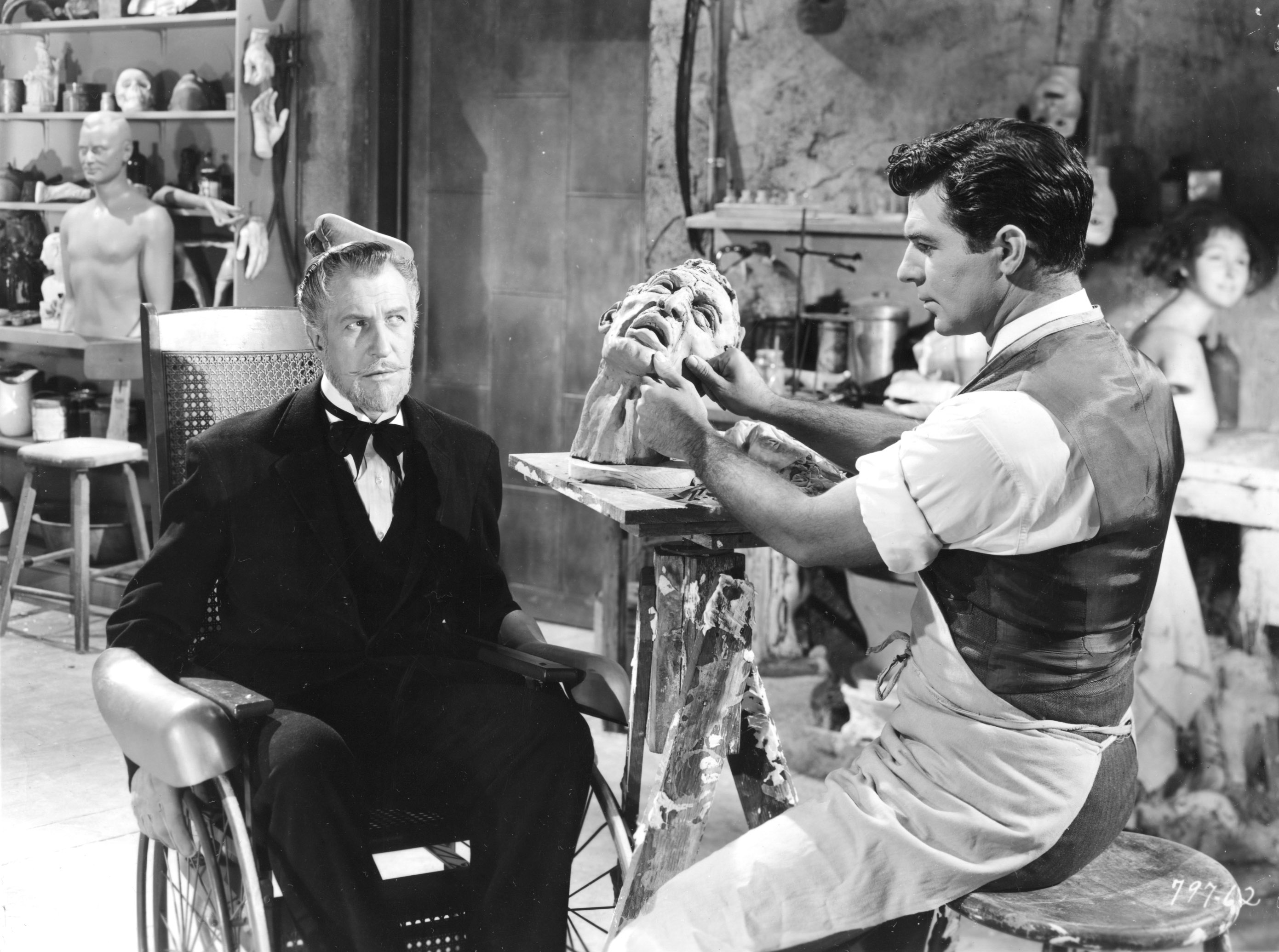 Vincent Price (seated) as Henry Jarrod, the role the launched him into horror stardom.