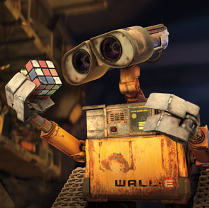 Wall-E examines a rubic's cube - an example of using pantomime to give personality to a non-speaking character.