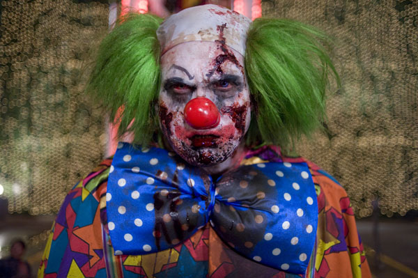 A clown zombie played by stuntman Derek Graf