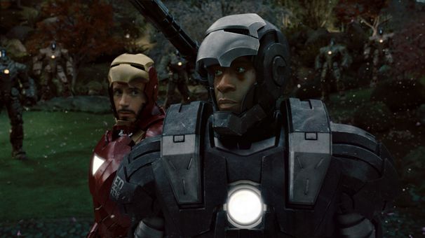 Stark (Robert Downey Jr) realizes he needs assistance from Rhodes (Don Cheadle)